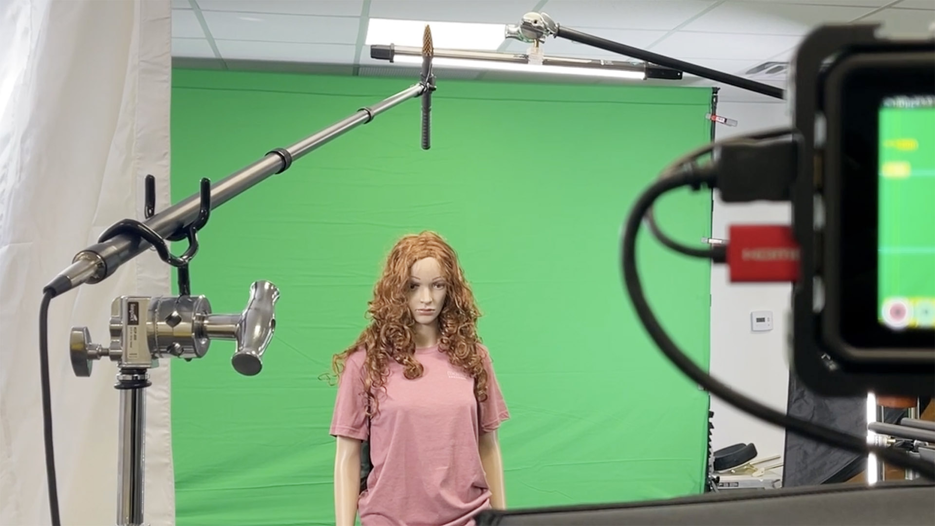 An audio mic boomed over the talent