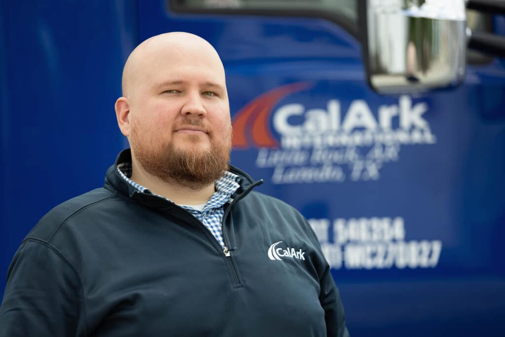 Work at CalArk Trucking Environmental Portrait Man and Truck